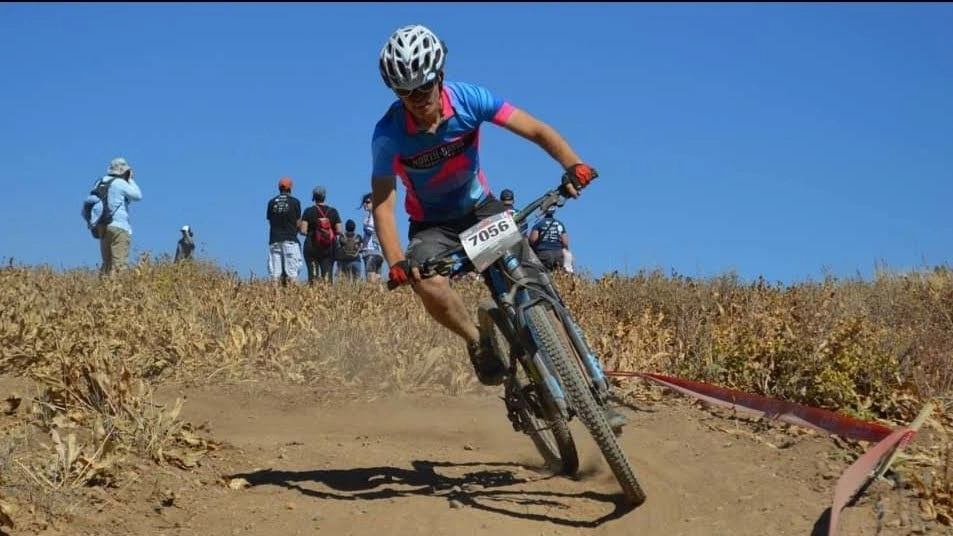 Jim-E racing a mountain bike